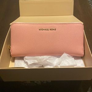 Pink women’s Michael Kors Wallet